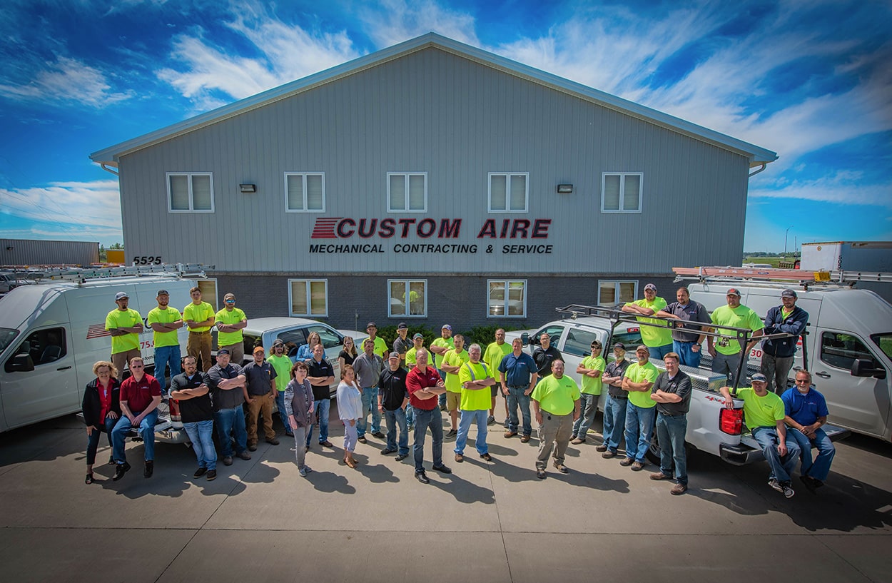 Group photo of Custom Aire employee team