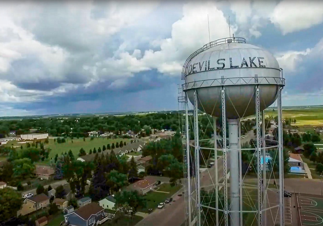 Aerial drone shot of water tower in Devils Lake.